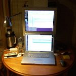 Computer screens representing IT and translation skills needed